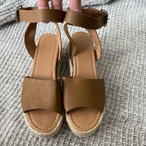 Brown platform sandal. Worn once. Size 7